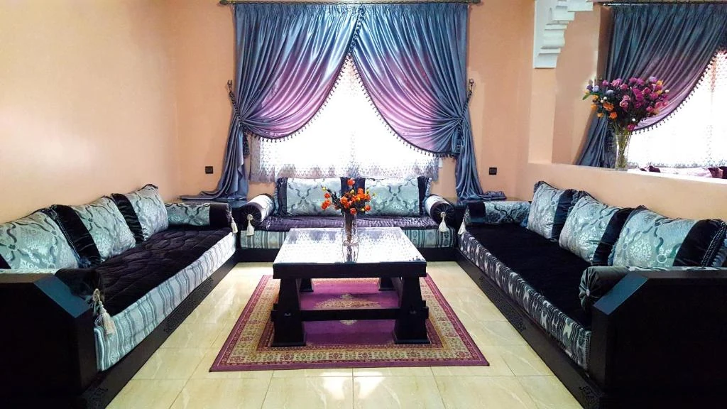 Main salon with traditional seating at Villa Annakhil Marrakech